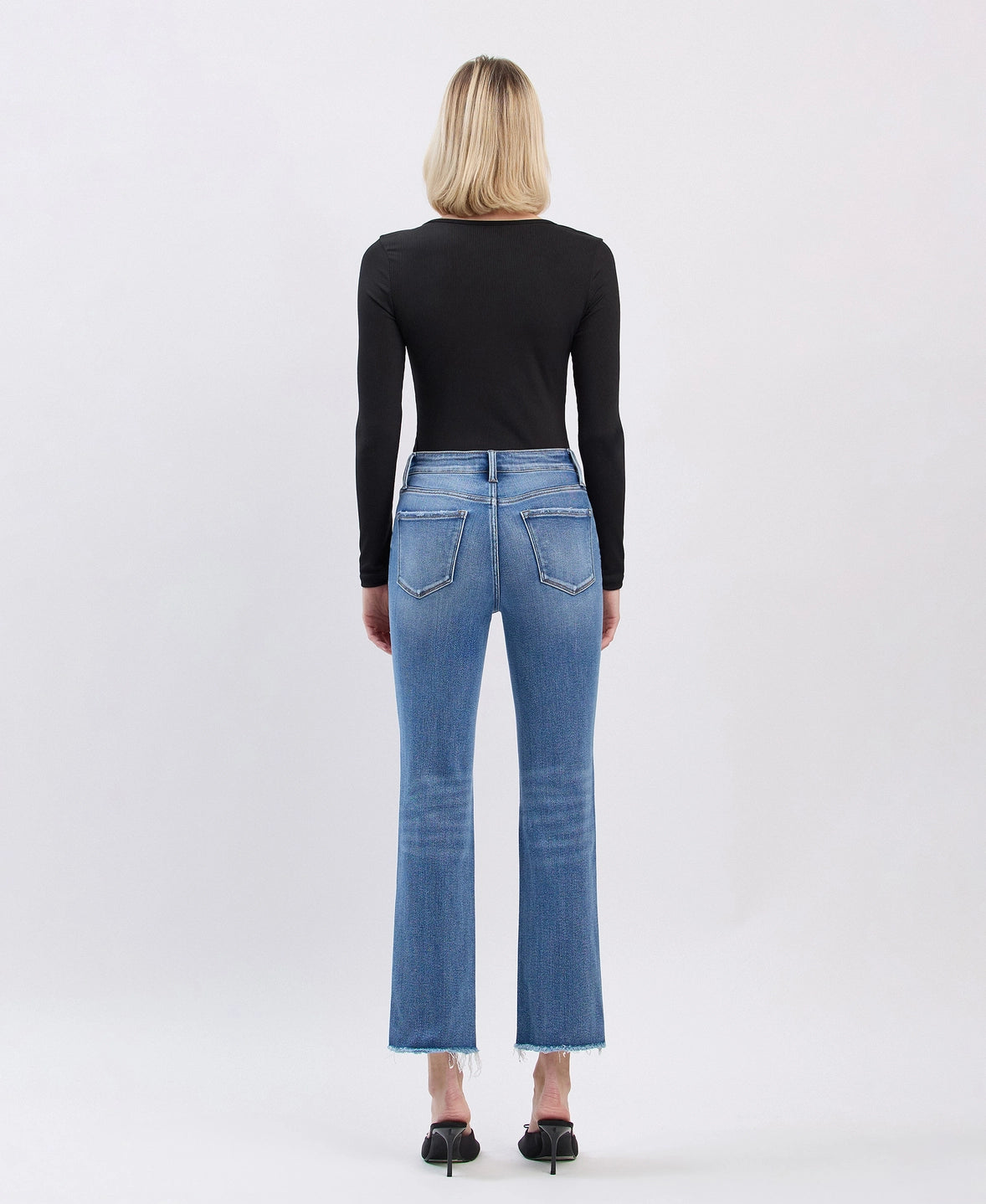 High Rise Uneven Raw Hem Slim Straight Jeans