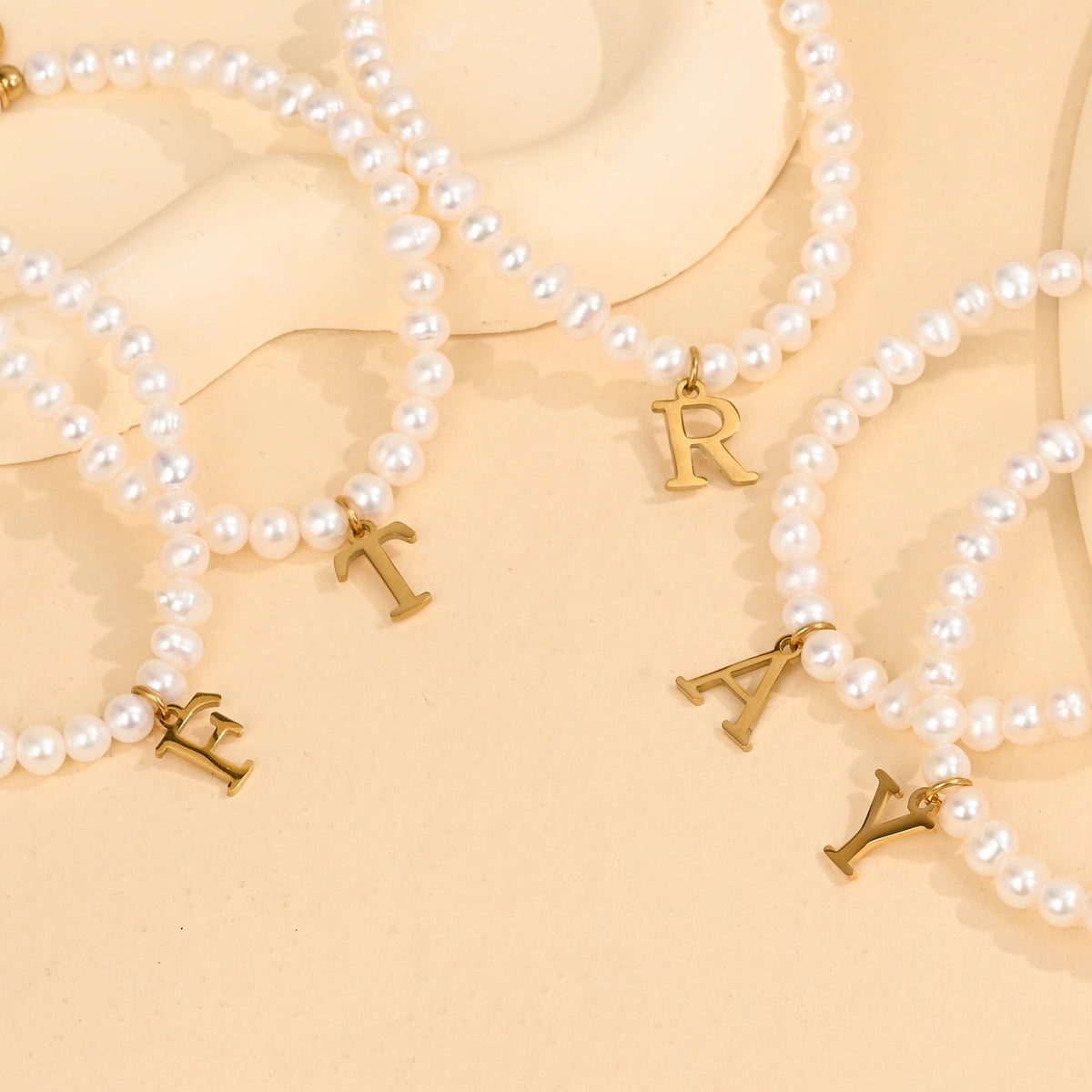 Golden Pearl Initial Letter Bracelet - D